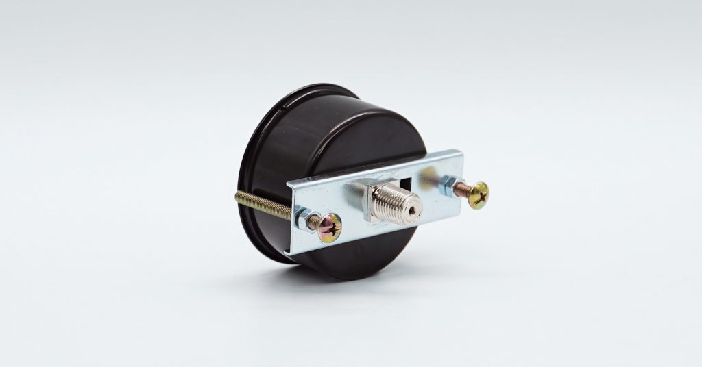 Pressure gauge with centre back mount and mounting bracket