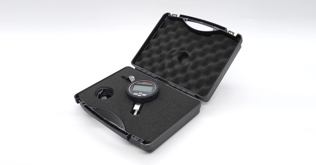 Digital pressure gauge with data logger and protective box