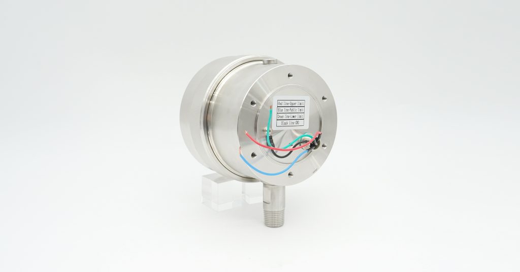 Explosion-proof contact pressure gauge showing wiring label with color-coded instructions